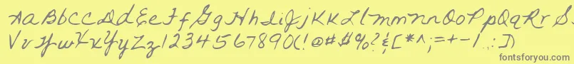 Lehn093-fontti – harmaat kirjasimet keltaisella taustalla
