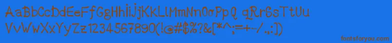 DccMarkerLatinoByDccanim Font – Brown Fonts on Blue Background