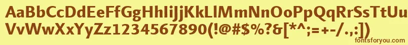 フォントLinotypefinneganExtrabold – 茶色の文字が黄色の背景にあります。