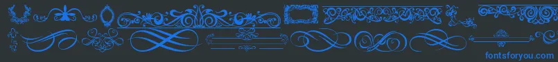 Czcionka OrnamentsLabelsAndFrames – niebieskie czcionki na czarnym tle