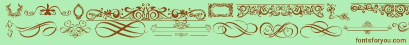 OrnamentsLabelsAndFrames-Schriftart – Braune Schriften auf grünem Hintergrund