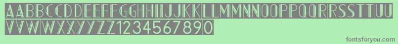 AcmountainInverted-Schriftart – Graue Schriften auf grünem Hintergrund