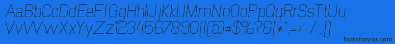 NewmediaRegularItalic Font – Black Fonts on Blue Background