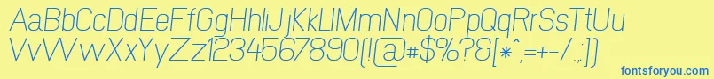 NewmediaRegularItalic Font – Blue Fonts on Yellow Background
