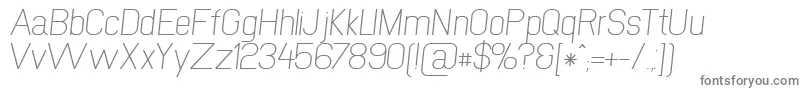 NewmediaRegularItalic-fontti – harmaat kirjasimet valkoisella taustalla
