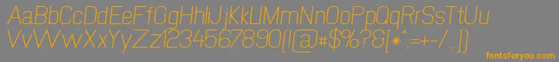 NewmediaRegularItalic Font – Orange Fonts on Gray Background