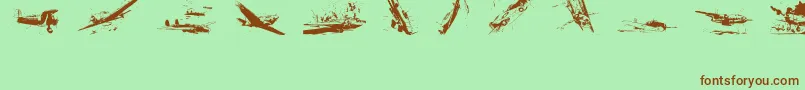 WorldWarIiWarplanes2-Schriftart – Braune Schriften auf grünem Hintergrund