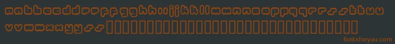 Шрифт Bukkake ffy – коричневые шрифты на чёрном фоне