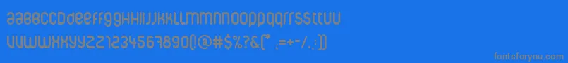 Corpuscare-fontti – harmaat kirjasimet sinisellä taustalla