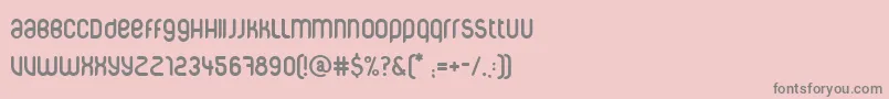 Corpuscare-fontti – harmaat kirjasimet vaaleanpunaisella taustalla