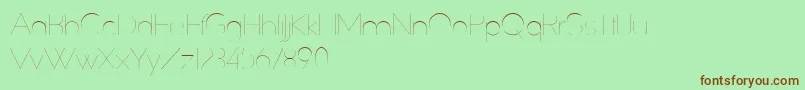 SlimExtreme Font – Brown Fonts on Green Background