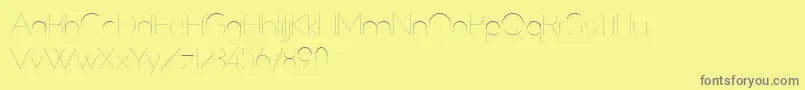 SlimExtreme Font – Gray Fonts on Yellow Background