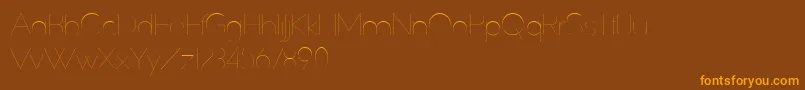 SlimExtreme Font – Orange Fonts on Brown Background