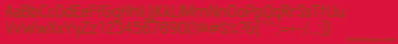 Fonte WumbologyBook – fontes marrons em um fundo vermelho