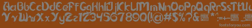 Alamak Font – Gray Fonts on Brown Background