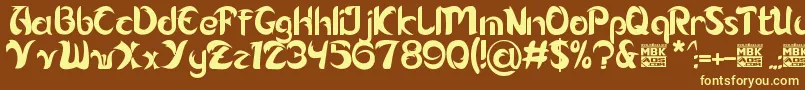 Alamak-fontti – keltaiset fontit ruskealla taustalla