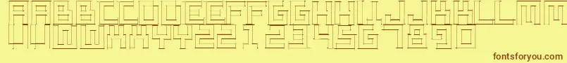 フォントSketchiquaa – 茶色の文字が黄色の背景にあります。