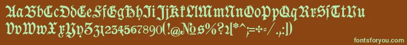 フォントGoeschen – 緑色の文字が茶色の背景にあります。