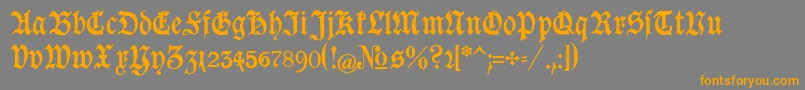 フォントGoeschen – オレンジの文字は灰色の背景にあります。