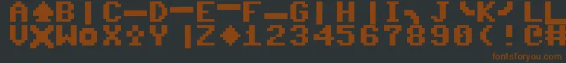 Fonte Commodoreserver – fontes marrons em um fundo preto
