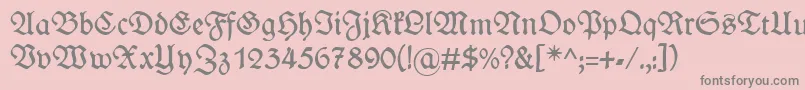 WieynckfrakturRegularunz1l-Schriftart – Graue Schriften auf rosa Hintergrund