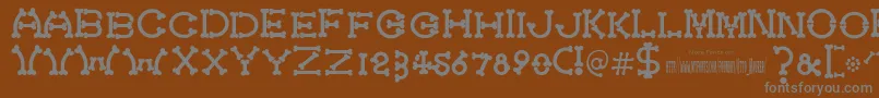 fuente Bonecracker – Fuentes Grises Sobre Fondo Marrón