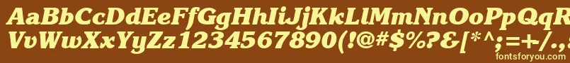 Karlajohnson8Heavycursivesh-fontti – keltaiset fontit ruskealla taustalla