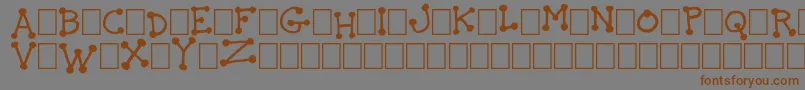 TheIdiot Font – Brown Fonts on Gray Background