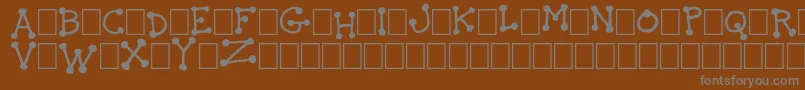 TheIdiot Font – Gray Fonts on Brown Background