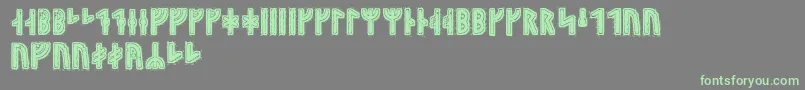 Hyrrokkinrunic-Schriftart – Grüne Schriften auf grauem Hintergrund