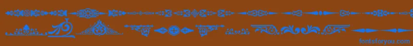 Ornamenttm2-fontti – siniset fontit ruskealla taustalla