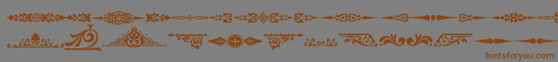 Ornamenttm2-Schriftart – Braune Schriften auf grauem Hintergrund