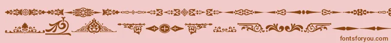Ornamenttm2-fontti – ruskeat fontit vaaleanpunaisella taustalla