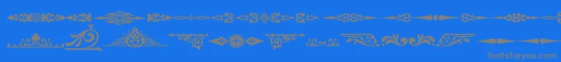Ornamenttm2フォントについての詳細 フォントOrnamenttm2 – 青い背景に灰色の文字