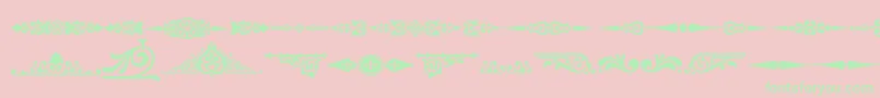 Ornamenttm2-fontti – vihreät fontit vaaleanpunaisella taustalla