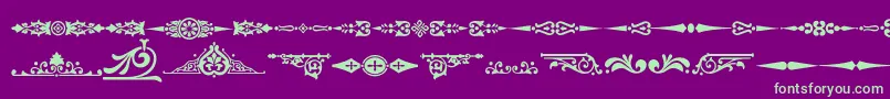 Czcionka Ornamenttm2 – zielone czcionki na fioletowym tle
