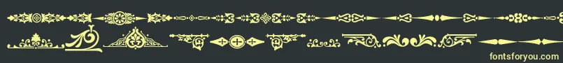 Weitere Informationen zur Ornamenttm2-Schriftart Ornamenttm2-Schriftart – Gelbe Schriften auf schwarzem Hintergrund