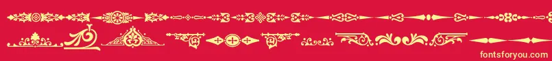 フォントOrnamenttm2 – 黄色の文字、赤い背景
