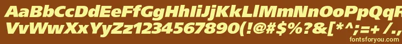 AgforeignerxcItalic-fontti – keltaiset fontit ruskealla taustalla
