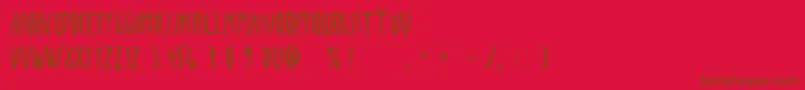 Penis-Schriftart – Braune Schriften auf rotem Hintergrund