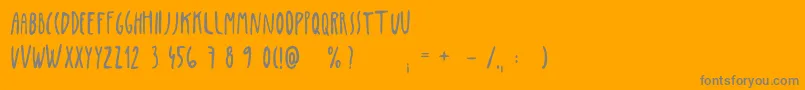 フォントPenis – オレンジの背景に灰色の文字