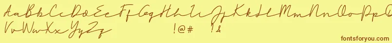 Rahayu-Schriftart – Braune Schriften auf gelbem Hintergrund
