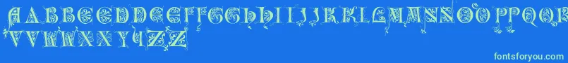 フォントIncunitials – 青い背景に緑のフォント