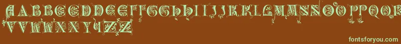 Incunitials Font – Green Fonts on Brown Background