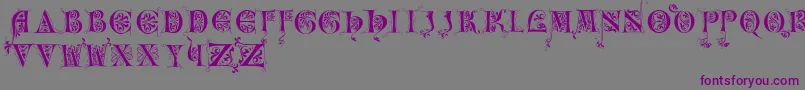Incunitials Font – Purple Fonts on Gray Background
