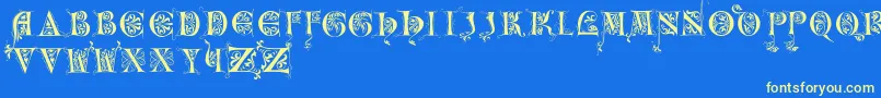 フォントIncunitials – 黄色の文字、青い背景