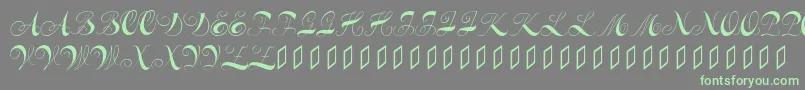 Шрифт Constanzeinitials – зелёные шрифты на сером фоне