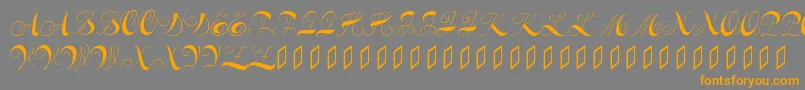 フォントConstanzeinitials – オレンジの文字は灰色の背景にあります。