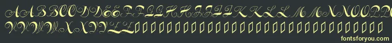 Constanzeinitials-fontti – keltaiset fontit mustalla taustalla