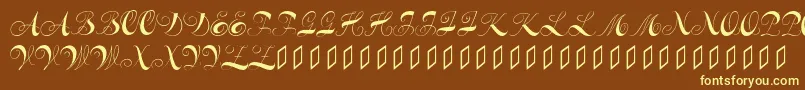 Constanzeinitials-fontti – keltaiset fontit ruskealla taustalla